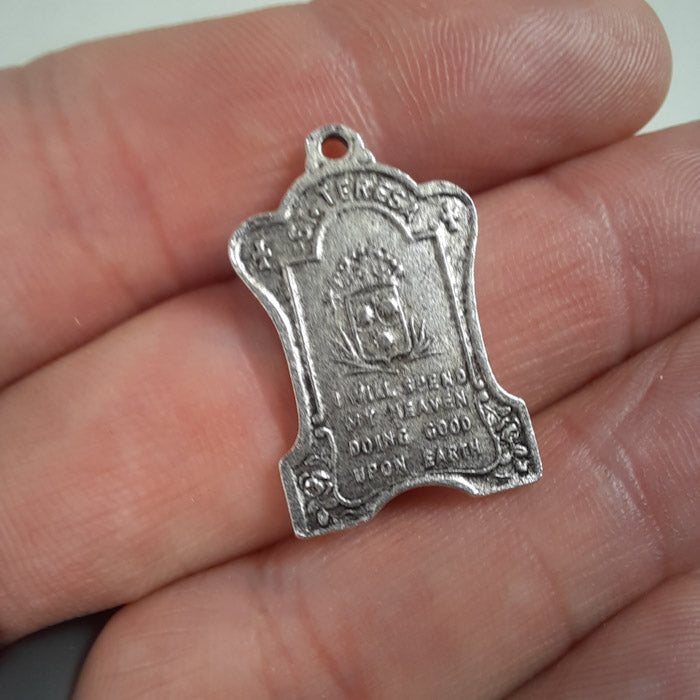 Saint Therese Lisieux Catholic Devotional Medal Pendant back